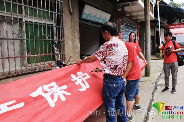 新葡萄8883官网AMG志愿者探访老街 为灾后修复建言献策